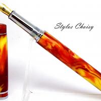 Plume elegance resine diamantee orangee et platine 3