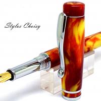 Plume elegance resine diamantee orangee et platine 6